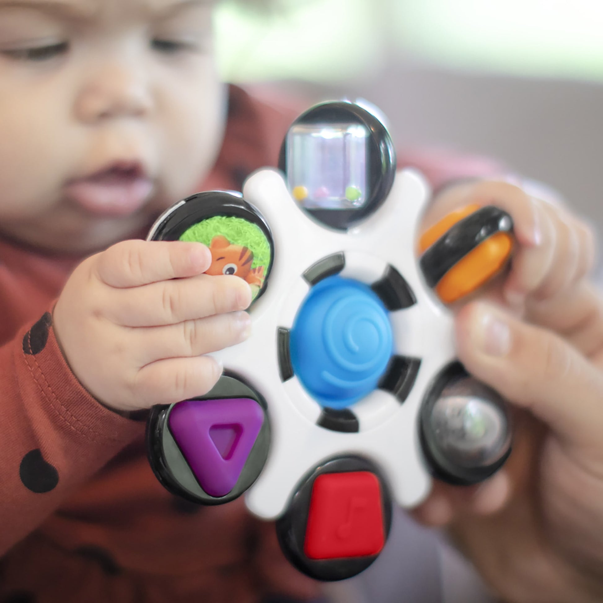 Baby Einstein Curiosity Clutch Twist and Pop Rattle Teether Infant Toy for Discovering Textures, Colors, Shapes, 3 Months+