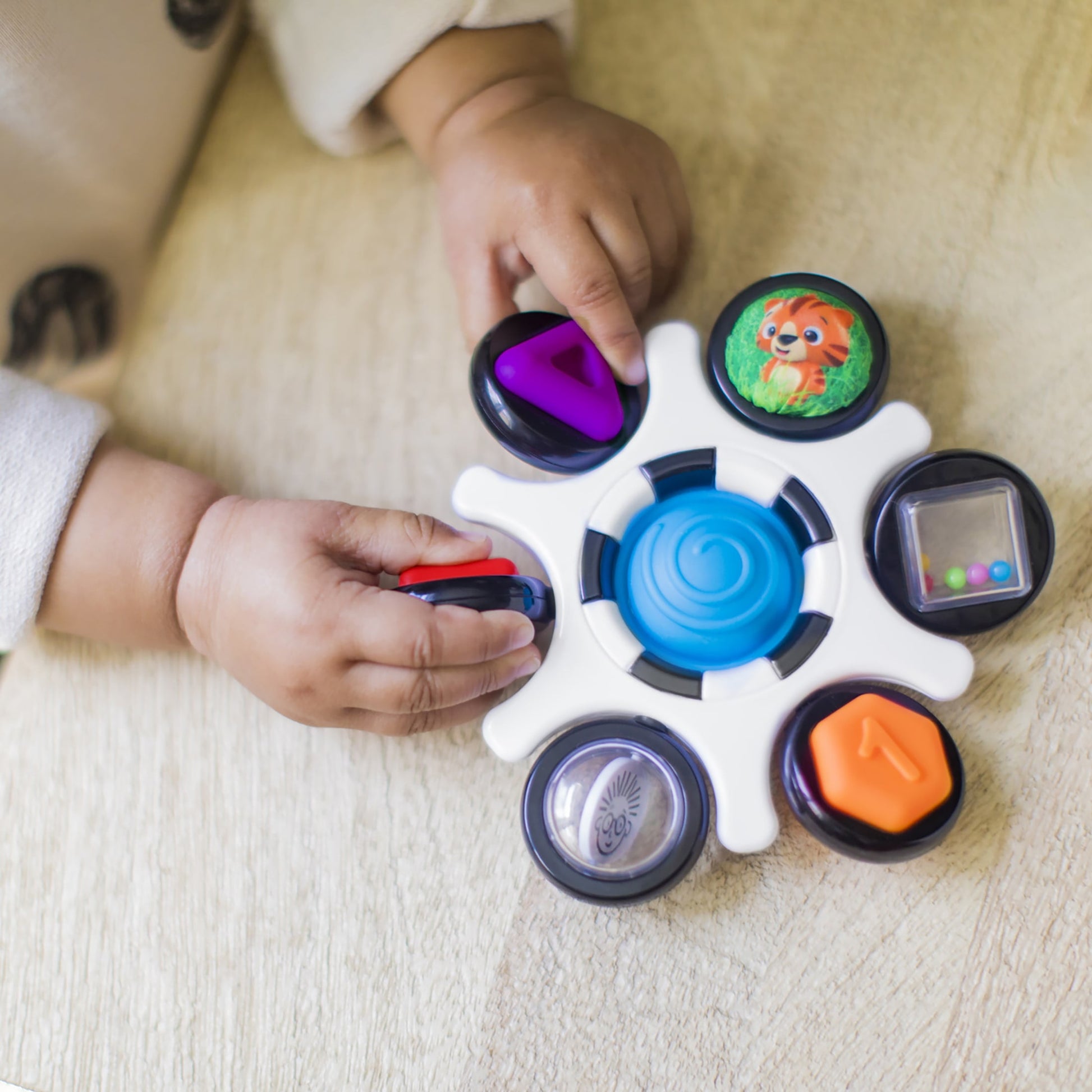 Baby Einstein Curiosity Clutch Twist and Pop Rattle Teether Infant Toy for Discovering Textures, Colors, Shapes, 3 Months+