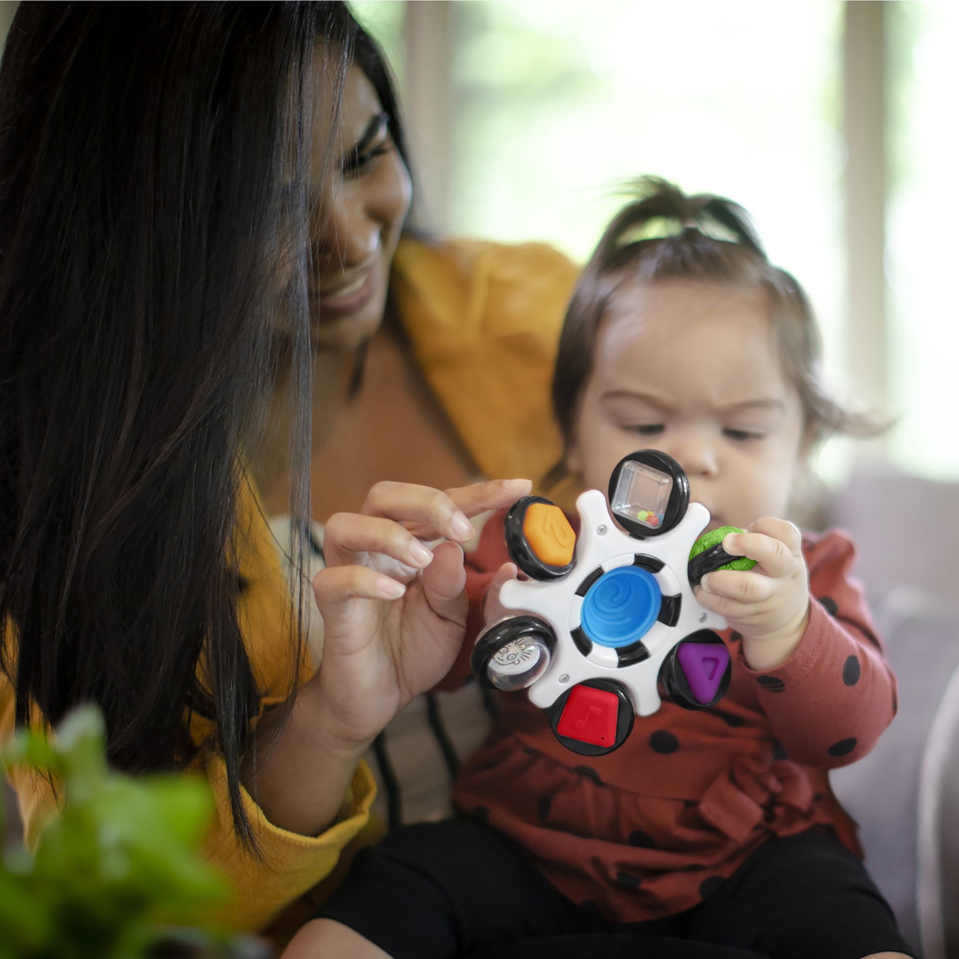 Baby Einstein Curiosity Clutch Twist and Pop Rattle Teether Infant Toy for Discovering Textures, Colors, Shapes, 3 Months+
