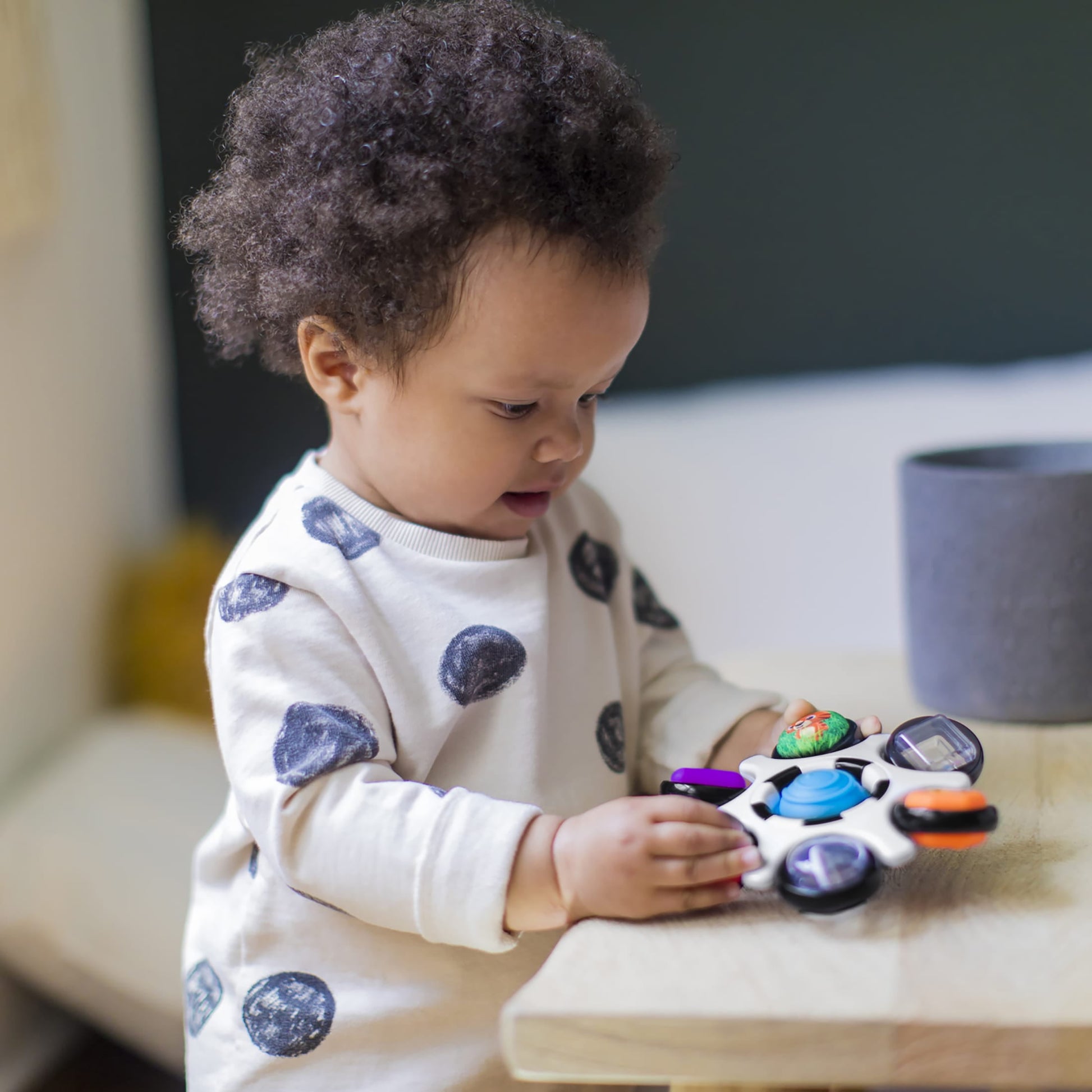 Baby Einstein Curiosity Clutch Twist and Pop Rattle Teether Infant Toy for Discovering Textures, Colors, Shapes, 3 Months+